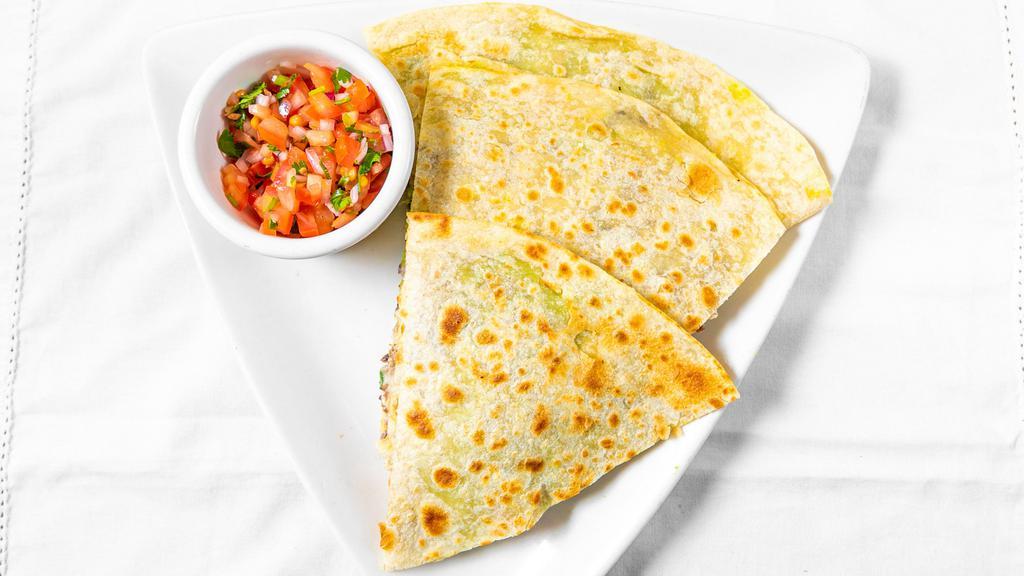 Grilled Chicken Quesadilla · Grilled Chicken with shredded Jack Cheese, Guacamole, Pico de Gallo and mexican cream. On a Flour Tortilla.