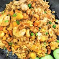 Pineapple Fried Rice · Our special yellow curry fried rice with shrimp, chicken, cashew nuts and pineapples stir-fr...