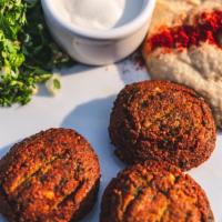 Falafel Plate · five falafel patties (spiced chickpeas formed into fritter-like patty and fried) served with...