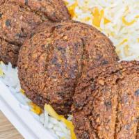 Falafel & Rice · Four falafel patties, served with saffron basmati rice and your choice of salad. Served with...