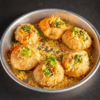 Dahi Puri · Hollowed semolina puri, potato garbanzo mash, chaat masala yogurt (Vegetarian)