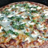 White Pizza  · Fresh garlic, ricotta cheese, fresh basil with olive oil sauce and mozzarella cheese.