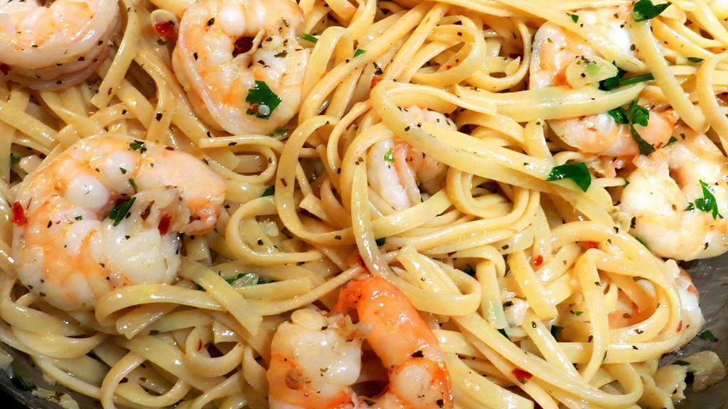Shrimp Scampi · Spaghetti, shrimp, organic lemon juice, white wine, garlic, extra virgin olive oil.