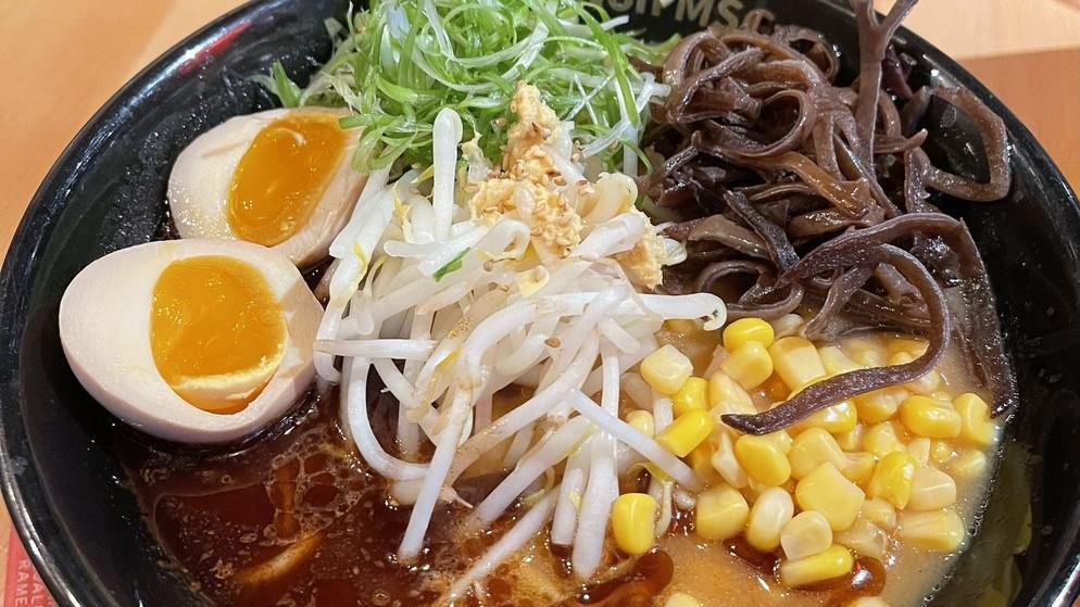 Vegan Miso Ramen/ ヴィーガン味噌ラーメン · Soup: house made miso broth, fish flavored oil and garlic oil. Topping : boiled bean sprouts, green onion, corn, wood ear mushroom, grated ginger, roasted sesame seeds and red pepper.