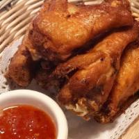 Chicken Wings (6) · Fried Chicken Wings. Choice of Spicy Garlic or Orange Sweet Sauce.