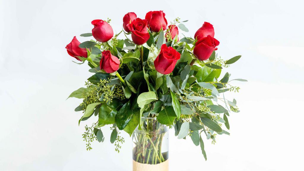 Lovebirds · Show your lovebird just how much you cherish them with these classic red roses. The vintage look of red roses in a clear glass vase is as timeless as your love.