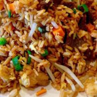 House Special Fried Rice · Beef, chicken, and shrimp included. Rice cooked in wok with eggs, carrot, pea, bean sprout a...