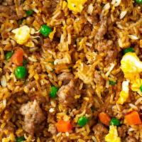 Pork Fried Rice · Rice cooked in wok with eggs, carrot, pea, bean sprout and green onion.