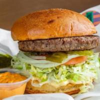 Impossible Veggie Burger · A juicy Plant-Based I-can't-believe-it's-not-meat IMPOSSIBLE patty topped with lettuce, toma...
