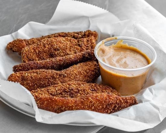 Chicken Tenders · 6 juicy all-white meat chicken tenders breaded in a thin crispy coating.  Served with western dipping sauce.