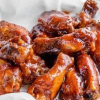 Bbq Wings · 1+ lb. of wings tossed in rich, tangy BBQ sauce.