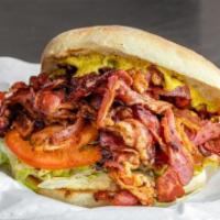 L.T. (Pastrami, Lettuce, Tomato) · 1/2 LB of crispy house-smoked pastrami, lettuce, tomato, mustard and a touch of Jeff's aioli...