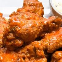Buffalo Hot Wings Party Pan + Ranch · 4.5 Lb of our crispy wings tossed in our house buffalo hot sauce. Approx: 50 pieces + house ...