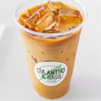 Vietnamese Coffee · Slow dripped French roast coffee mixed with sweetened condensed milk.