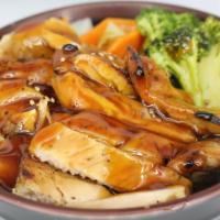Teriyaki Chicken Bowl · Grilled chicken with teriyaki sauce, rice and salad.
