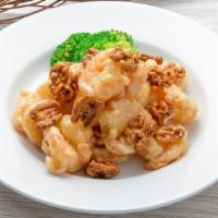 Honey Walnut Shrimp · Crispy shrimp served on a creamy sweet delight sauce accented with honey glazed walnuts and ...