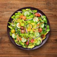 Lavish House Salad · Made with crisp romaine lettuce, cucumbers, sweet tomatoes, and creamy avocado, then tossed ...