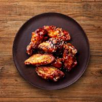 Bone-In Wing  (6 Pcs) · 6 Enjoy our juicy traditional wings in your choice of sauce