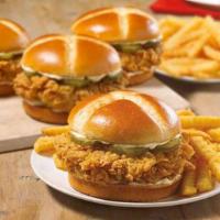 Chicken Sandwich Feed 4 Combo · We crafted a sandwich using our legendary hand-battered chicken fillet placed between a hone...