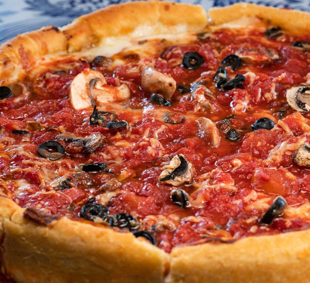 Classic Vegetable Pizza · Black olive and mushroom. No modifications: to add or change toppings, choose the Chicago deep dish 