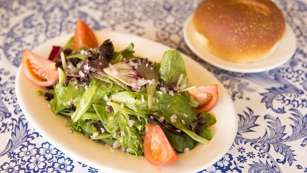 Mixed Green Salad · Organic baby lettuces, tomato and chopped shallots in our shallot-dijon mustard vinaigrette.