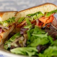 Vegan Veggie Chicken Panini · Grilled veggie chicken in our tangy tomato sauce with vegan mayo romaine lettuce, tomato, on...