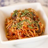 Vegan Spaghetti & Meatballs · Seasoned Masa Beyond meatballs, spaghetti, marinara, vegan parmesan & fresh basil