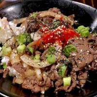 Gyudon · Thin slice beef, onion, scallion, pickled red ginger, sesame seeds, kizami nori.