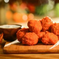 10 Pieces (Boneless) · Choice of up to two flavors. Served with carrots, celery and blue cheese or ranch dressing.