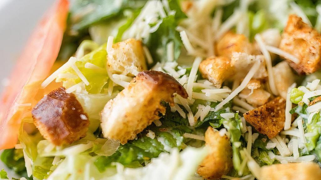 Caesar Salad · Fresh crisp romaine lettuce with parmesan cheese, croutons and original caesar dressing.