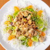 Chinese Chicken Salad · Chopped romaine lettuce over rice noodles mixed with original Chinese dressing and topped wi...