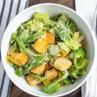 Caesar Salad · Organic romaine lettuce, croûton & vegan parmesan cheese tossed in Caesar dressing