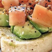 Avocado Toast · Diced tomatoes, fresh avocado drizzle with olive oil & sesame seasoning serve on sourdough b...