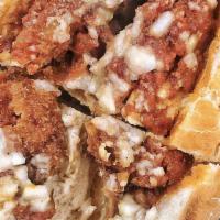 Chicken Parmesan Sub · Serve on a French Roll. Breaded vegan chicken over house marinara sauce, top with vegan mozz...