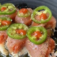 Jessica Roll · Crabmeat, cucumber, onion, cilantro mix inside. Spicy tuna, Albacore on top with jalapeno