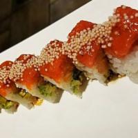 Bang Bang Roll · Salmon, jalapeno, avocado inside with soypaper.
Spicytuna and Rice cracker on top