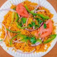 Chicken Biryani · A delicious savory rice dish that is loaded with spicy marinated chicken.