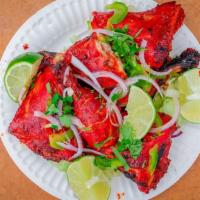 Tandoori Chicken · Chicken marinated in spices, cooked in special clay oven.