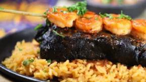 Cielo, Mar Y Tierra · Tender strips of top sirloin steak, chicken breast and jumbo shrimp marinated in special spi...