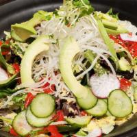 House Salad · Mixed Green with  Bell Tomatoes.