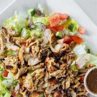 Kenny'S Chicken Gyro Salad · Chopped lettuce, tomatoes, onions topped with marinated chicken shawarma, and creamy house d...