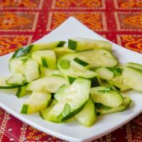 Cucumber Salad · A medley of fresh cucumbers with fresh cilantro and a hint of lemon juice.
