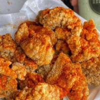 Popcorn Chicken · Marinated bite-sized chicken deep fried and seasoned.