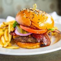 Bella Bru Burger · Certified Angus beef, lettuce, red onions, tomato, pickles, spicy aioli, seeded bun. add che...