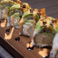 Green Carpet · Spicy tuna, cucumber, shrimp tempura inside top avocado, eel sauce spicy mayo.