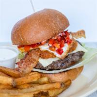 The Hangover Burger · Melted jack cheese, bacon, fried egg. hash browns, roasted red pepper, muce tomato, red onio...