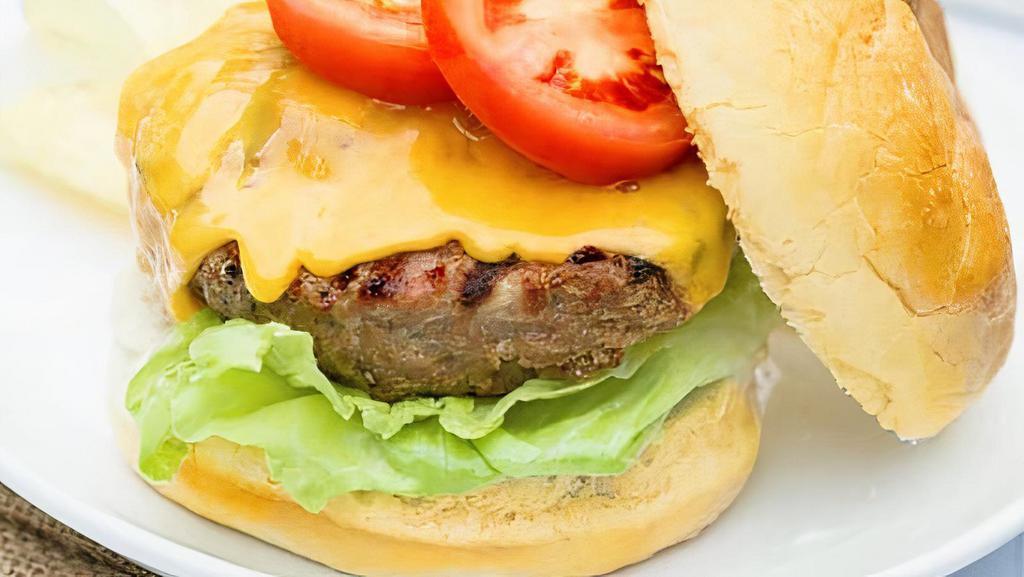 Tasty Turkey Burger · cheese, lettuce, tomato, onions, pickles,mustard, ketchup, mayo, mild boss sauce