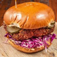 Cajun Chicken Sandwich* · Battered and fried chicken breast seasoned with Cajun spices, cabbage, pickles and jack chee...