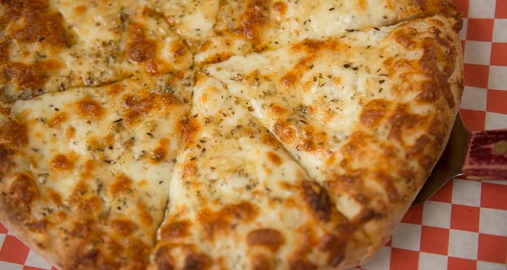 White Pizza · Ricotta cheese, mozzarella cheese, pecorino romano cheese, oregano, garlic, olive oil.