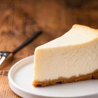 New York Cheesecake · A slice of authentic NY Cheesecake